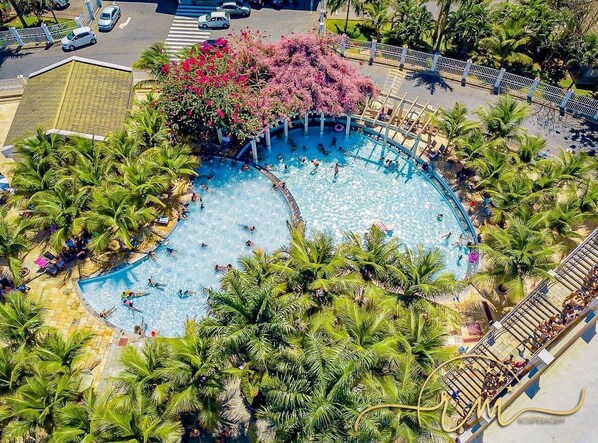 15 outdoor pools, pool umbrellas, pool loungers