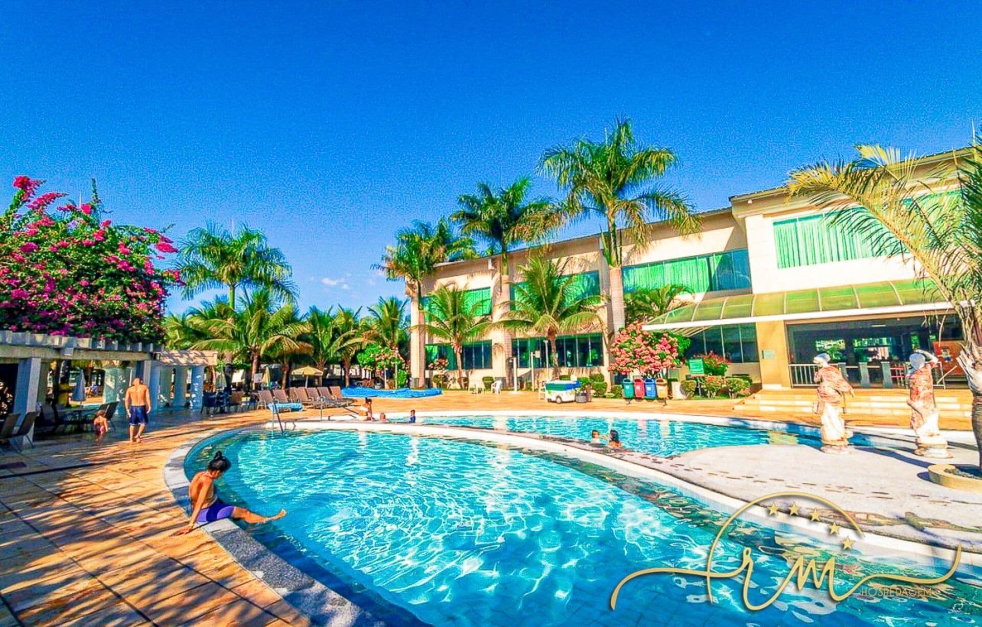 15 outdoor pools, pool umbrellas, sun loungers