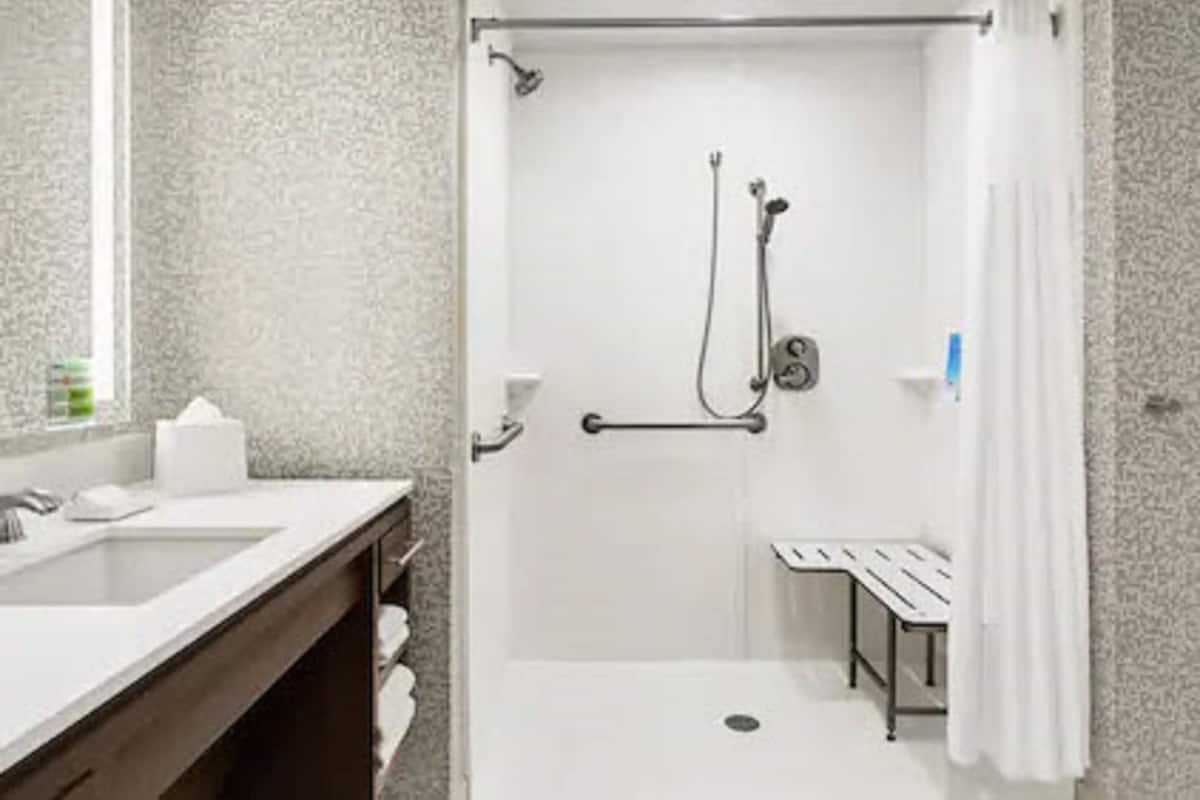 Eco-friendly toiletries, hair dryer, towels, soap
