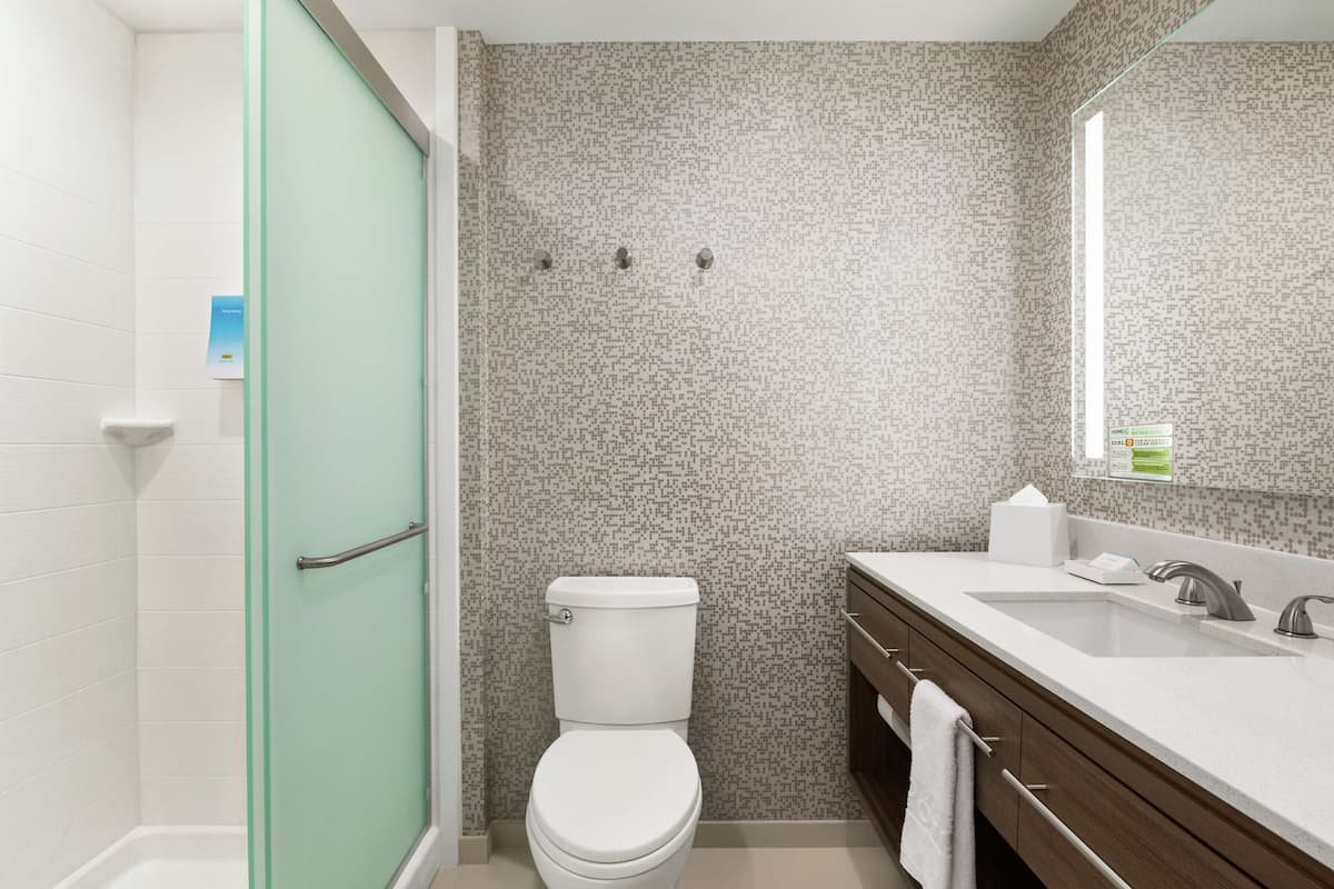 Eco-friendly toiletries, hair dryer, towels, soap