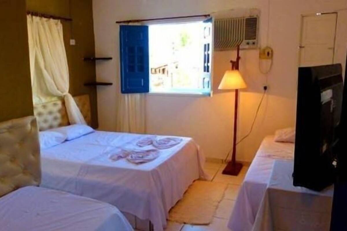 Chambre quadruple | Minibar, fer et planche à repasser, accès au Wi-Fi (inclus)