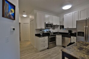 Comfort Apartment, 2 Bedrooms (216 B) | Private kitchen | Full-size fridge, microwave, oven, dishwasher - Flagler Beach Vacation Rentals (Flagler Beach)