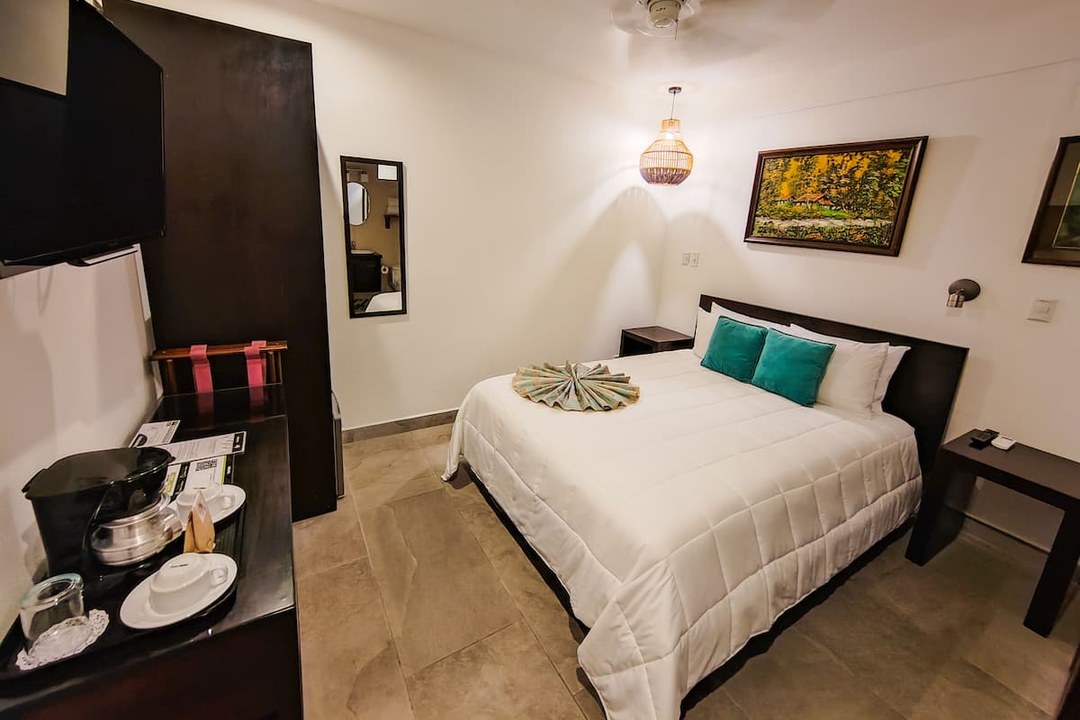 Premium bedding, down comforters, Select Comfort beds, minibar
