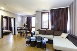 Apartment | Living room | Flat-screen TV - CityHome Aparthotel (Sofia)