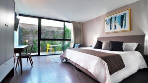Comfort Studio, 1 Bedroom, Patio | Down comforters, in-room safe, desk, laptop workspace