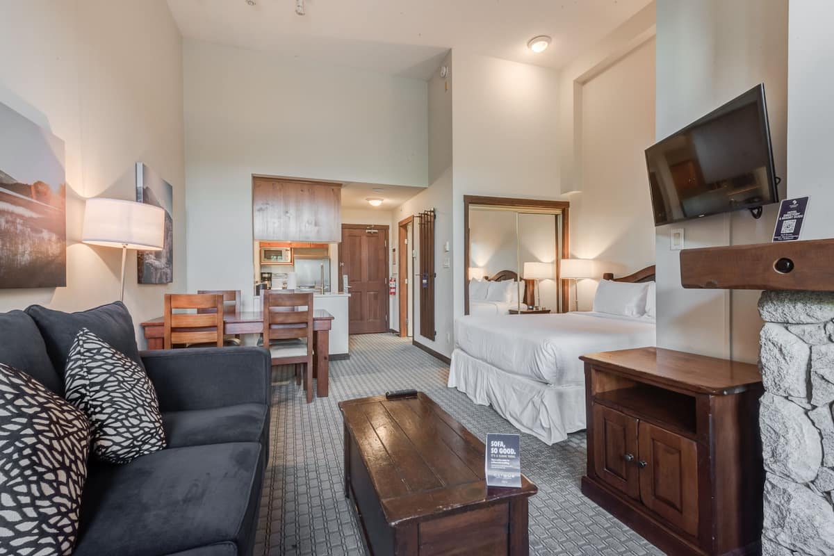 premium studio suite, kitchen | living area | 32-inch smart tv with cable channels, tv, fireplace