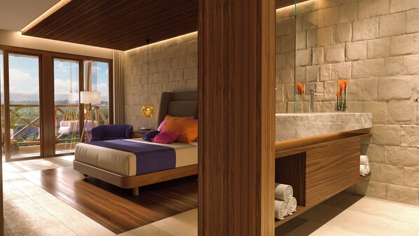 A modern bedroom with a bed, a nightstand, a large window with a view, and a stone wall.