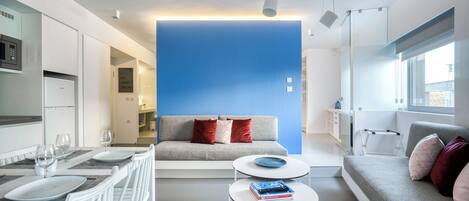 Apartment, 2 Bedrooms (Blue) | Living area | Flat-screen TV