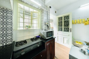 Fridge, microwave, electric kettle, cookware/dishes/utensils