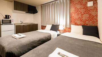 Desk, blackout drapes, free WiFi, bed sheets