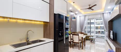Fridge, microwave, cookware/dishes/utensils