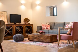 Deluxe Apartment, 2 Bedrooms | Living area | LCD TV