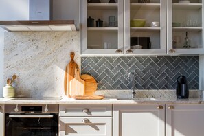 Executive Apartment, 2 Bedrooms | Private kitchen | Full-size fridge, microwave, oven, stovetop