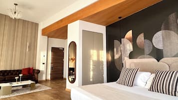 Deluxe Suite, City View | Down comforters, minibar, in-room safe, blackout drapes