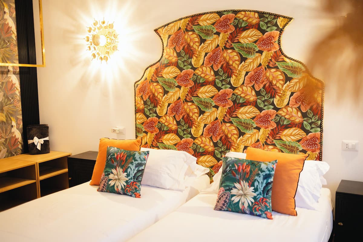 Design Apartment | 1 bedroom, down comforters, minibar, in-room safe