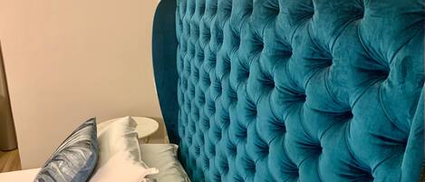Deluxe Suite | Down comforters, minibar, in-room safe, individually decorated