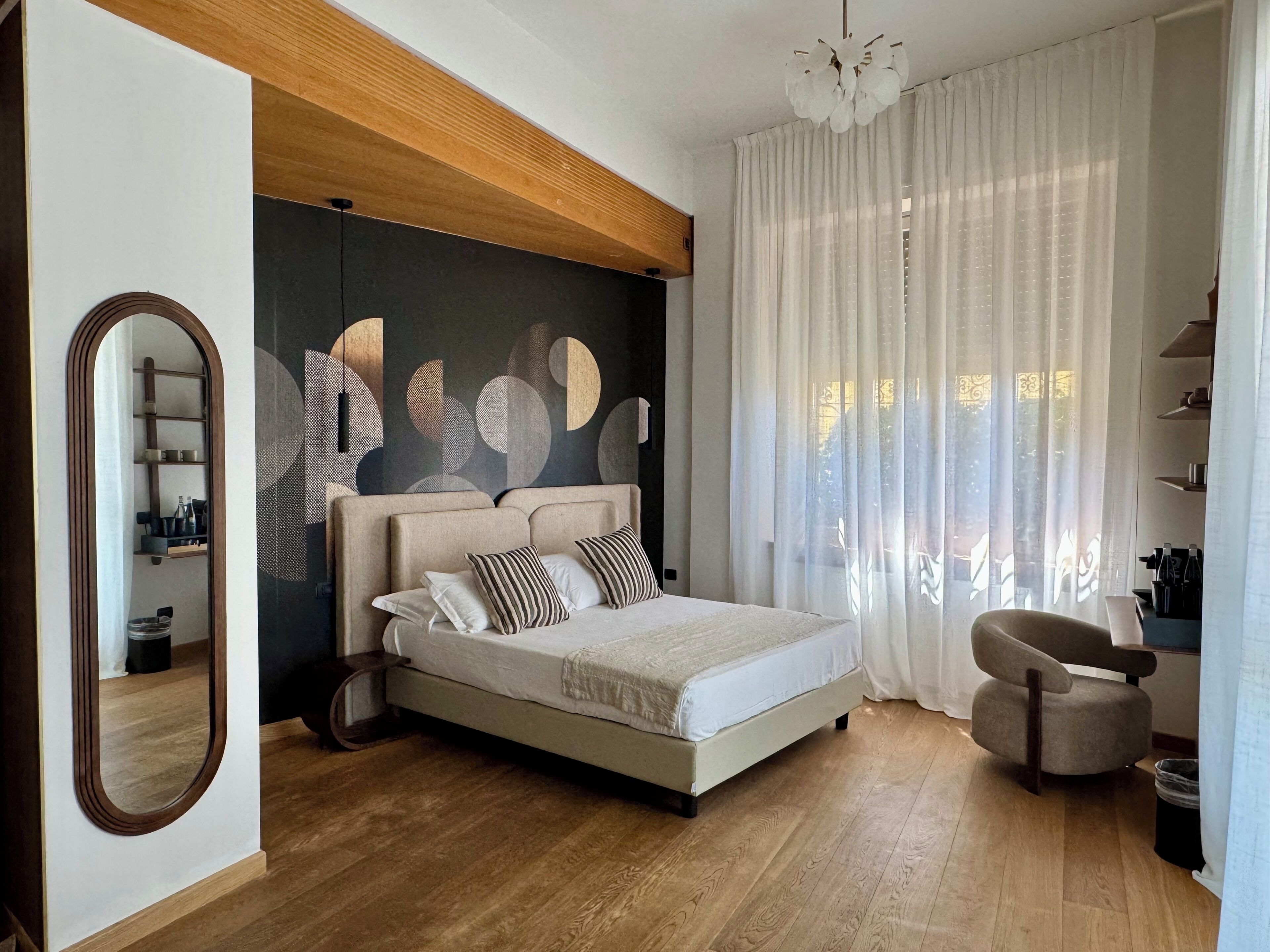 Deluxe Suite, City View | Down duvets, minibar, in-room safe, blackout curtains