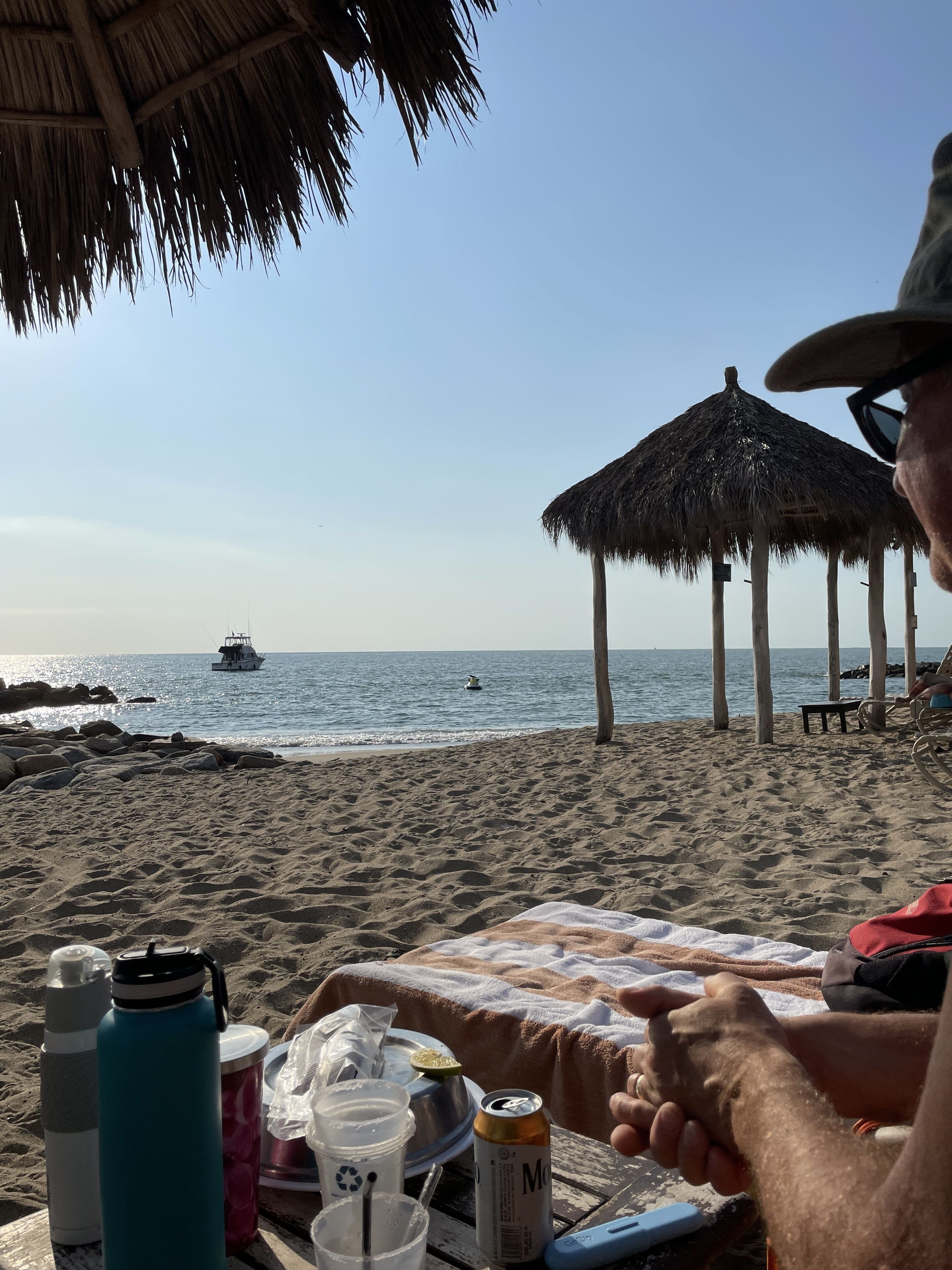 On the beach, sun-loungers, beach towels