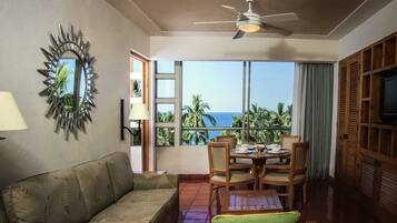 Flat-screen TV, ping pong, books, computer monitors