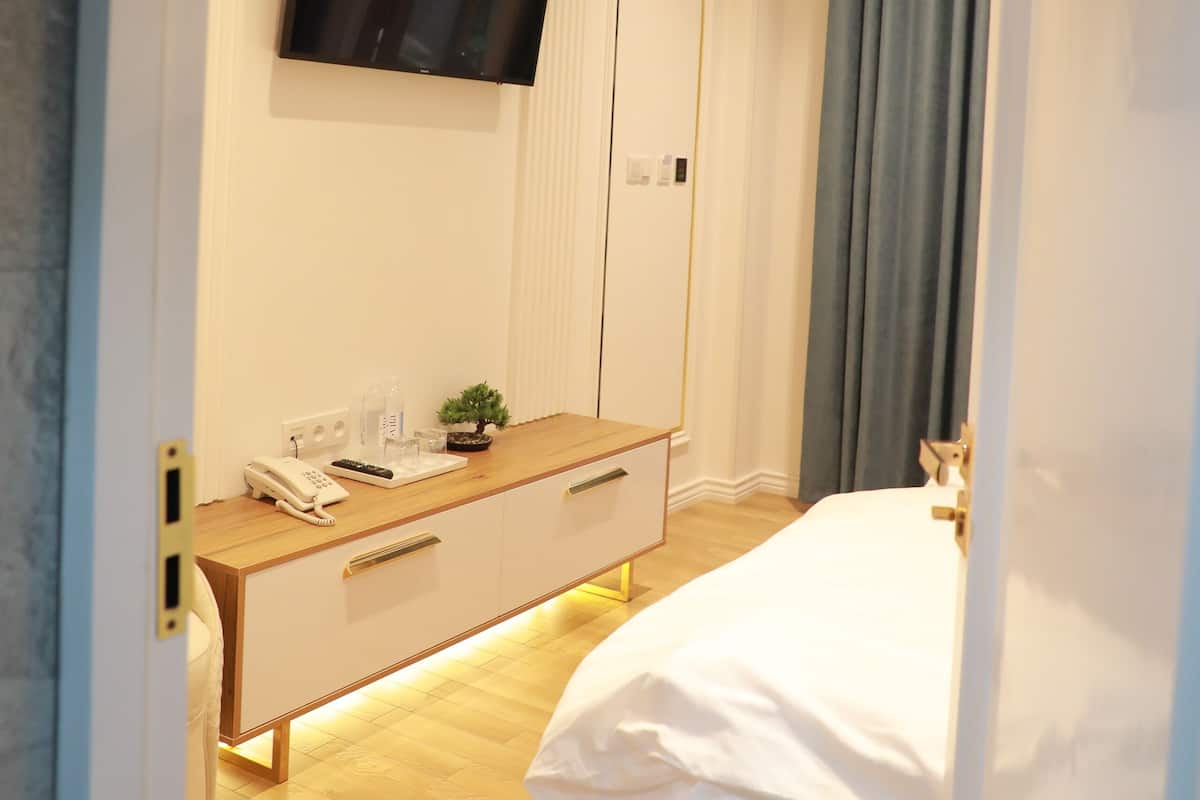 Premium bedding, memory foam beds, minibar, in-room safe