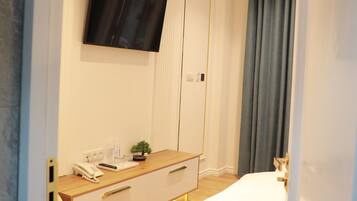 Premium bedding, memory foam beds, minibar, in-room safe