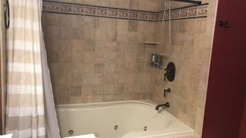 Combined shower/tub, jetted tub, hair dryer, towels