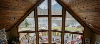 Beautiful riverfront cabin on 5 acres. Breathtaking views. Sleeps 12.