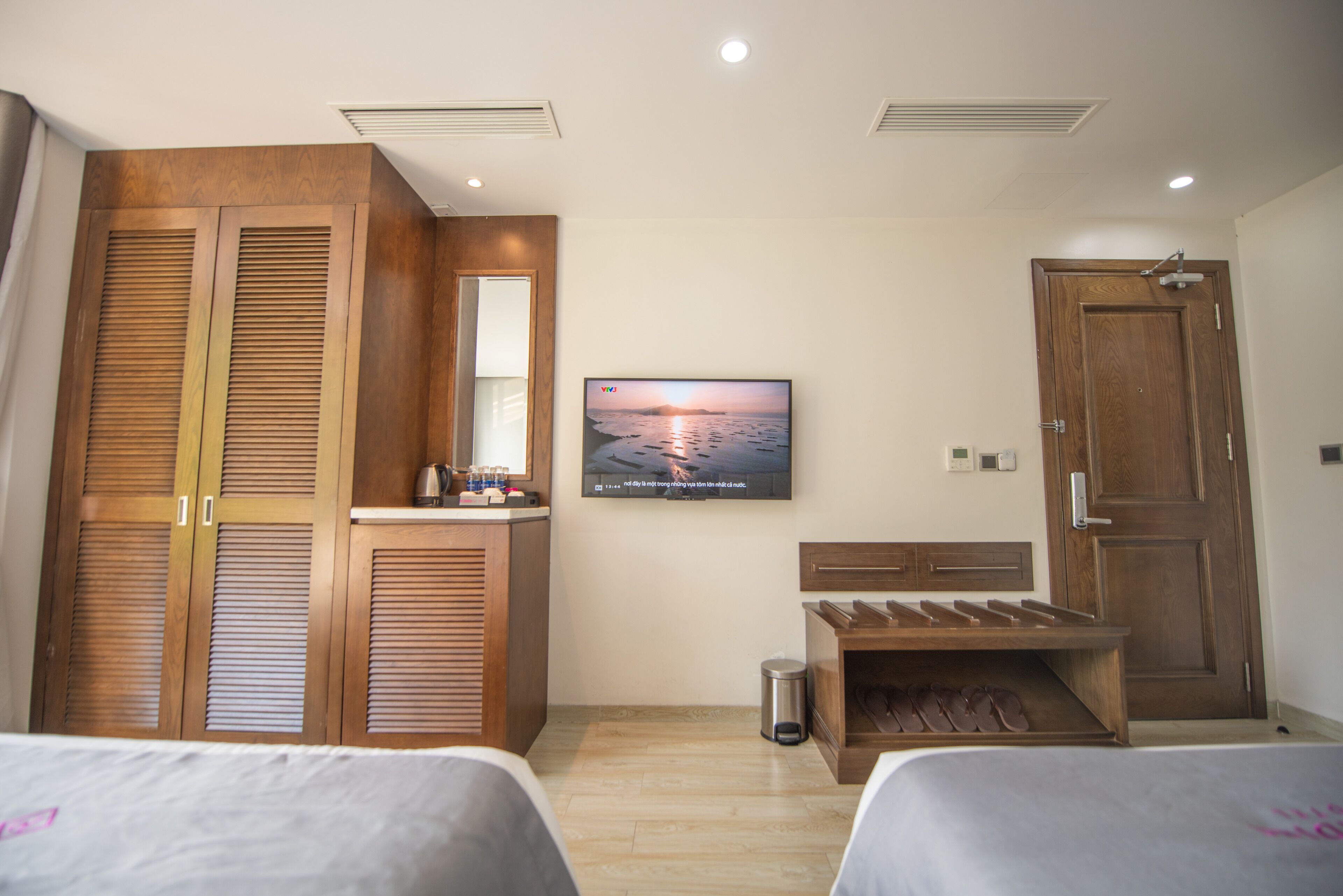 deluxe triple room | premium bedding, down duvets, memory-foam beds, minibar