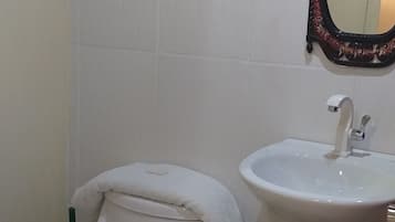 Shower, towels, soap, shampoo
