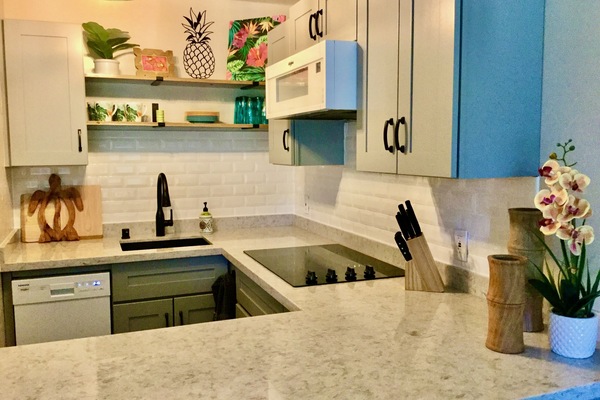 New kitchen with new Whirlpool appliances including dishwasher