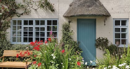 Beautiful mid century thatched cottage in the prettiest part of Winterton-on-Sea