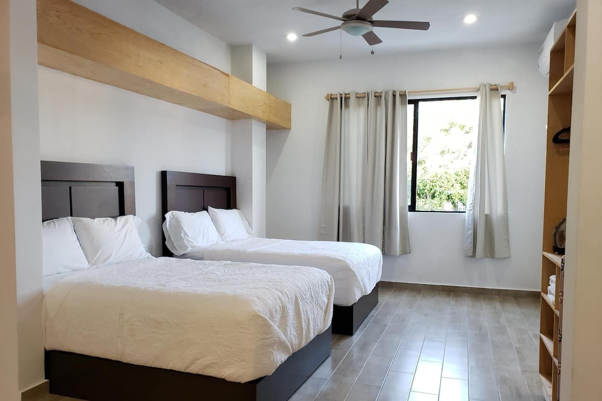 1 bedroom, Egyptian cotton sheets, premium bedding, Tempur-Pedic beds