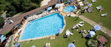 Indoor pool, outdoor pool, open 8:00 AM to 7:00 PM, pool umbrellas