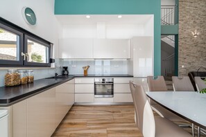 Fridge, microwave, oven, stovetop - Villa Oslo - luxury place with sea views & heated pool, 300m from sandy beach (Omis)