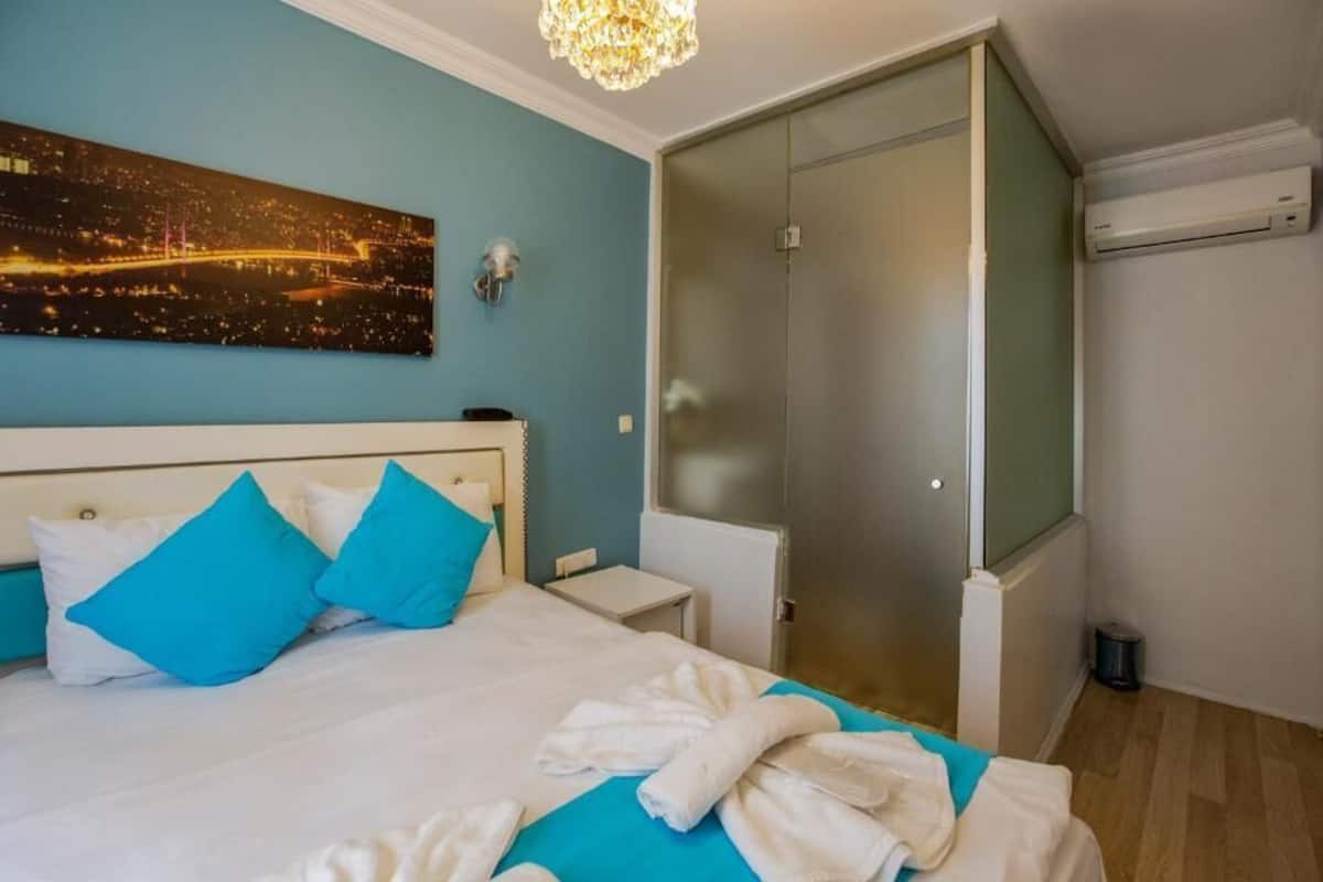 Chambre économique double ou avec lits jumeaux | Accès au Wi-Fi (inclus)