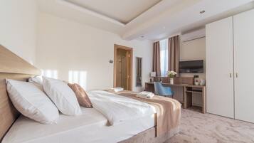 Premium bedding, pillowtop beds, minibar, blackout drapes