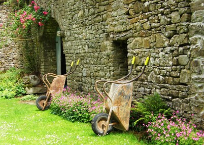 A gardener's cottage tucked away in the corner of an old country house estate.