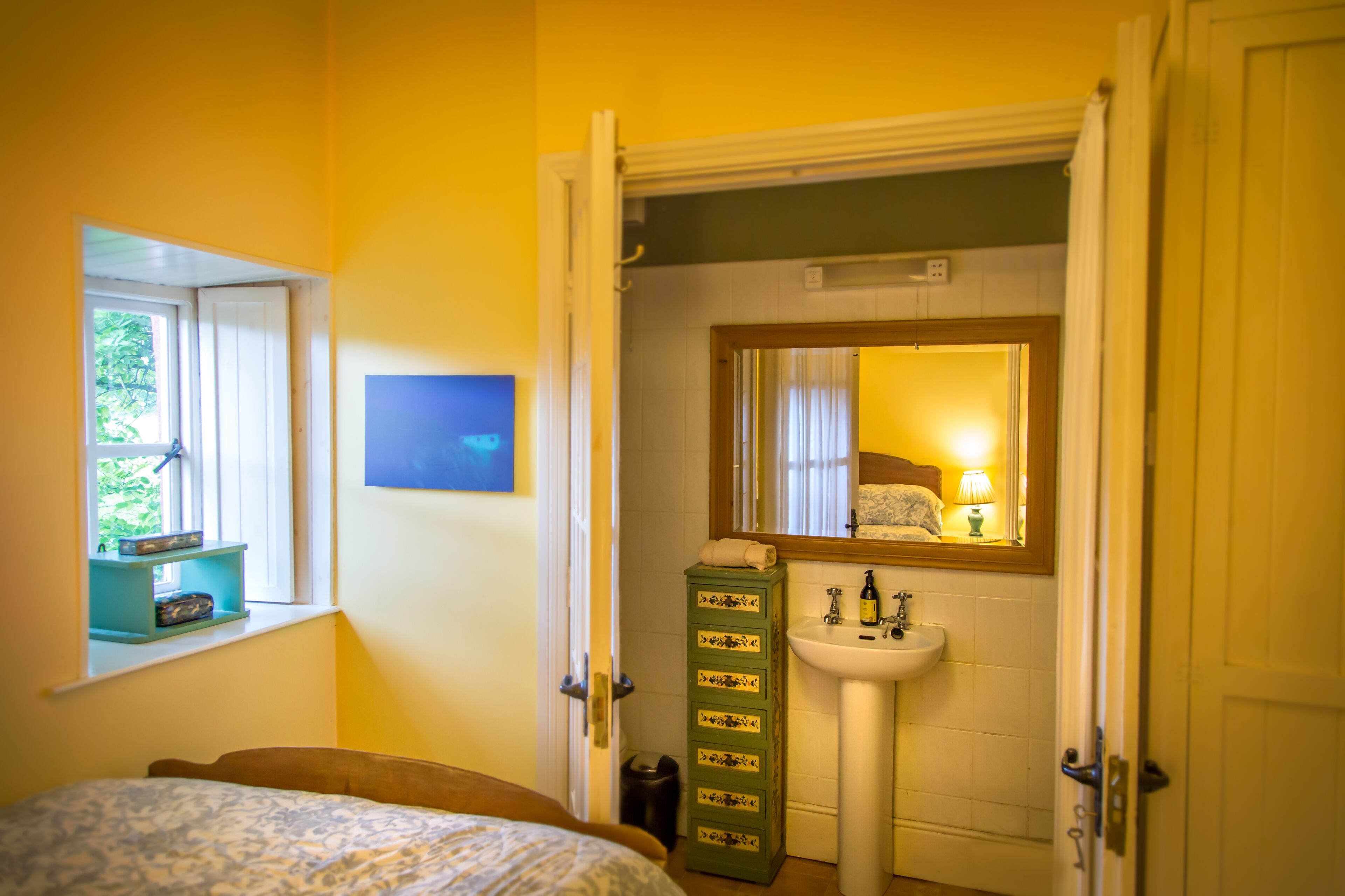 A gardener's cottage tucked away in the corner of an old country house estate.