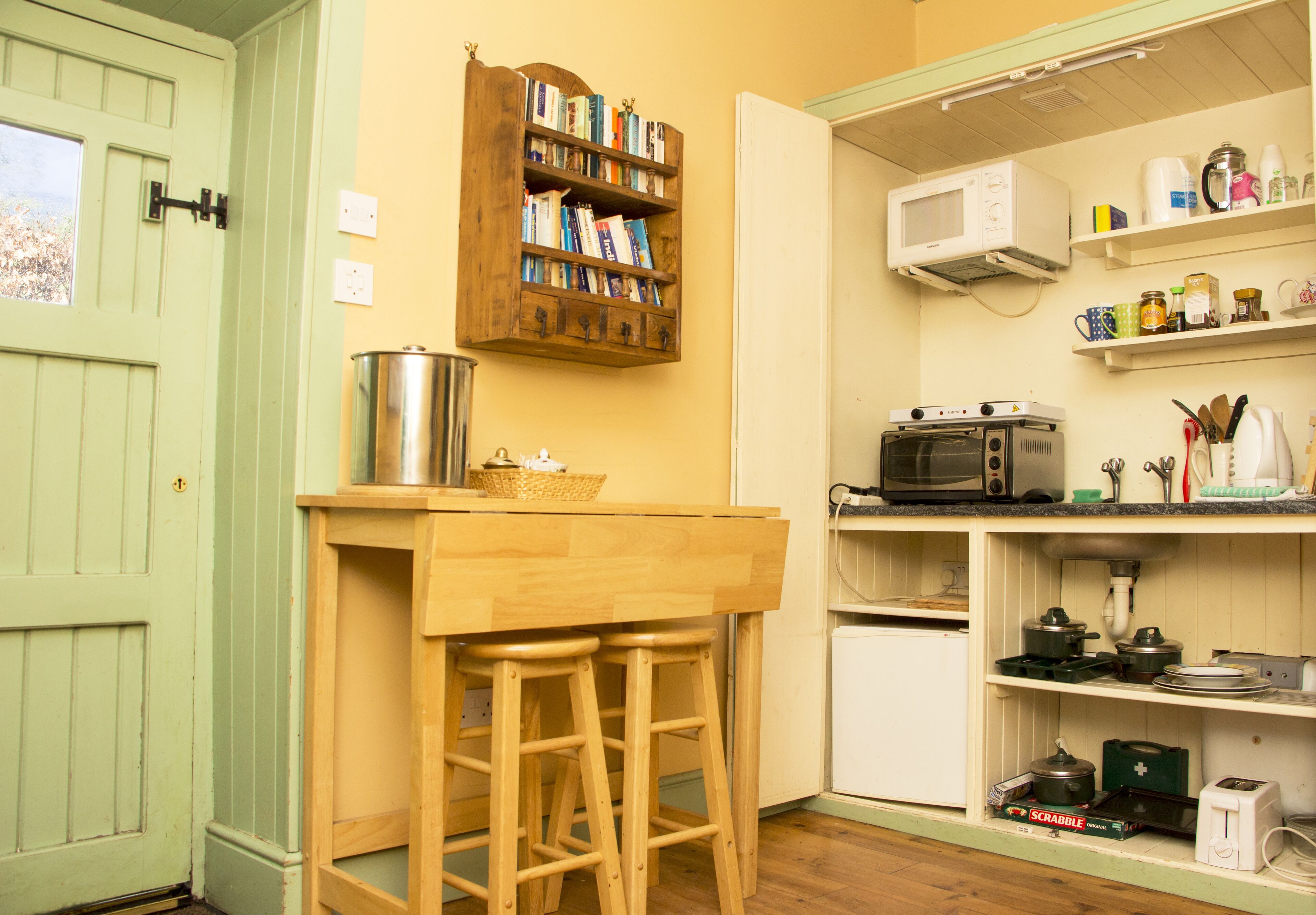 A gardener's cottage tucked away in the corner of an old country house estate.