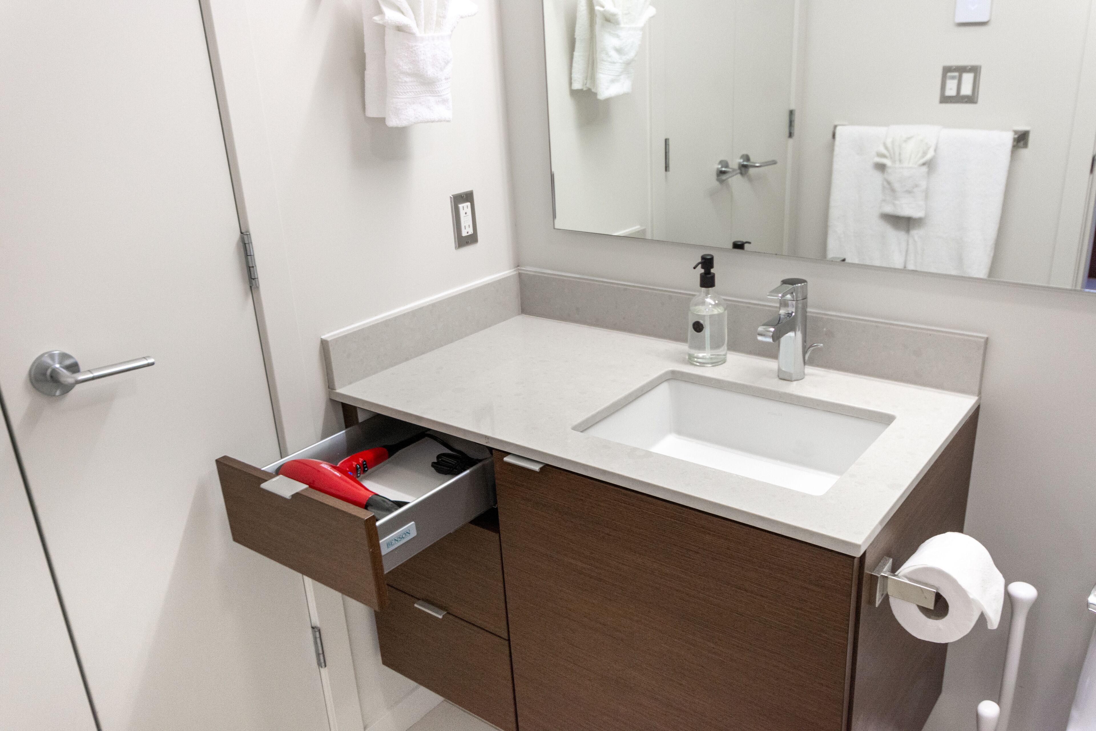 Combined shower/tub, hair dryer, towels, soap