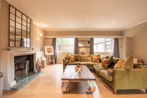 Large lounge with a real fire and comfortable sofa.