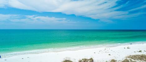 On the beach, sun-loungers