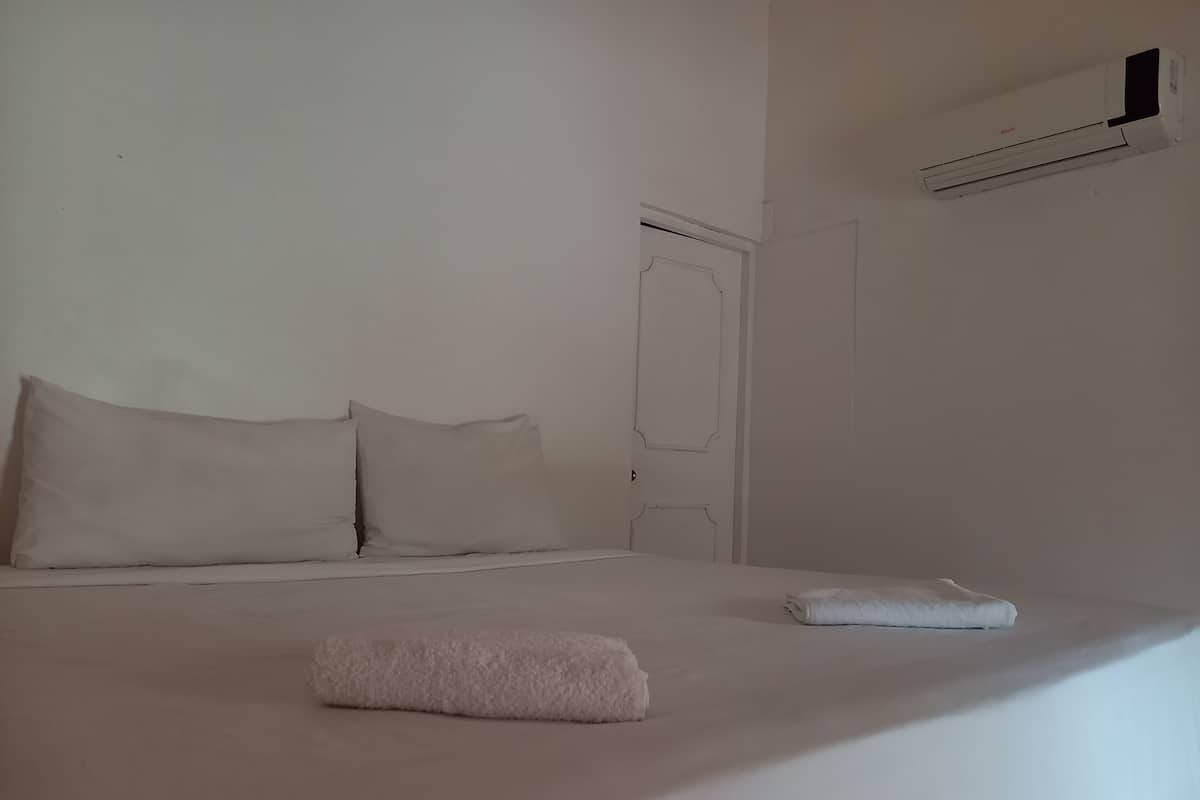 Exclusive Condo, 1 King Bed, Garden View | 1 bedroom, hypo-allergenic bedding, in-room safe, blackout curtains