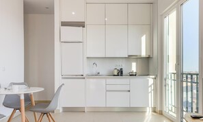 Fridge, microwave, coffee/tea maker, toaster
