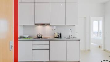 Fridge, microwave, coffee/tea maker, toaster