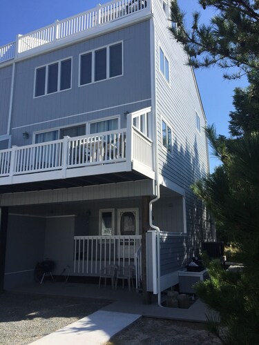 Steps to a private beach. Ocean and bay views from decks.