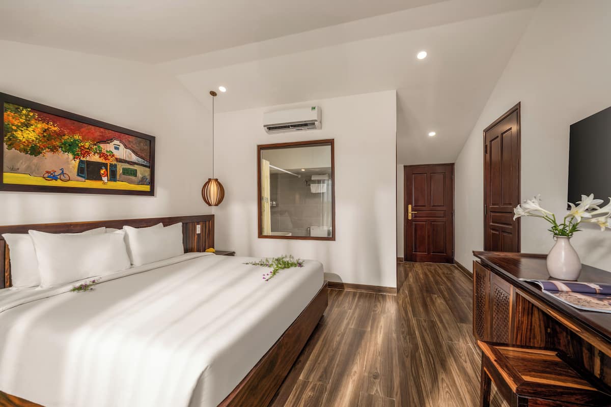 Habitación Deluxe | 1 dormitorio, ropa de cama de alta calidad, minibar y caja fuerte