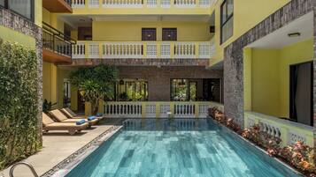 Outdoor pool, open 8:00 AM to 8:00 PM, pool umbrellas, sun loungers
