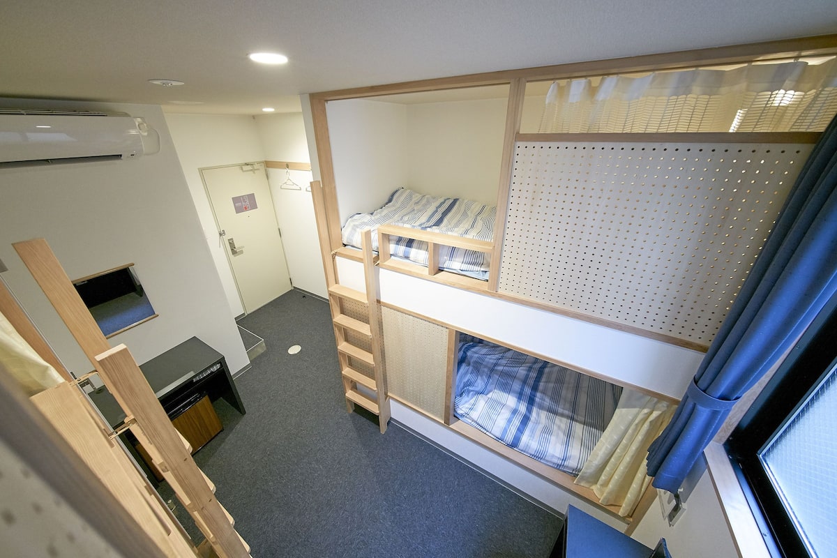 Desk, laptop workspace, blackout curtains, free WiFi