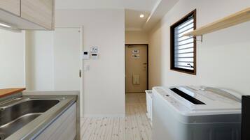 Basic Apartment | Private kitchen | Full-sized fridge, microwave, stovetop, coffee/tea maker